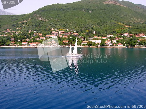 Image of Sailing boat over blue water