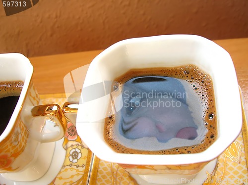 Image of coffee cup with woman face