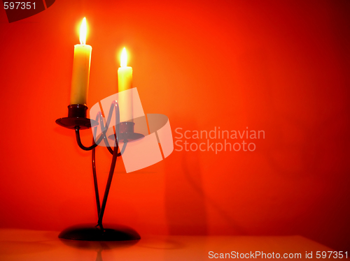 Image of Candles over orange