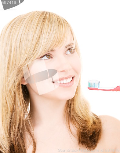 Image of happy girl with toothbrush