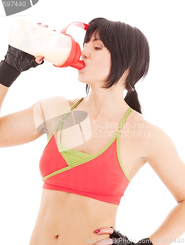 Image of fitness instructor with protein shake