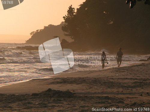 Image of Couple Walking Down the Beach