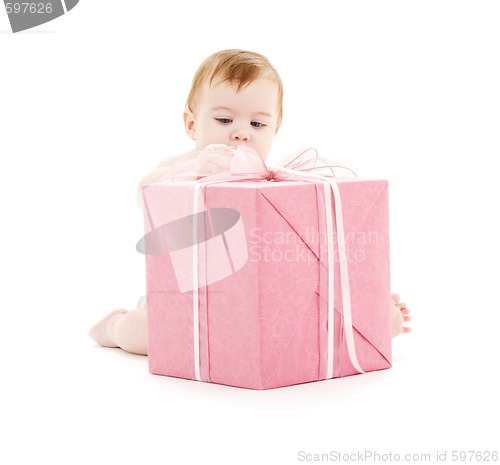 Image of baby boy with big gift box