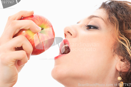 Image of woman eating a red apple.