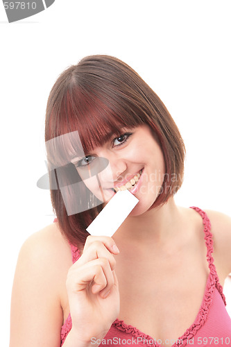 Image of Beautiful woman holding empty white card