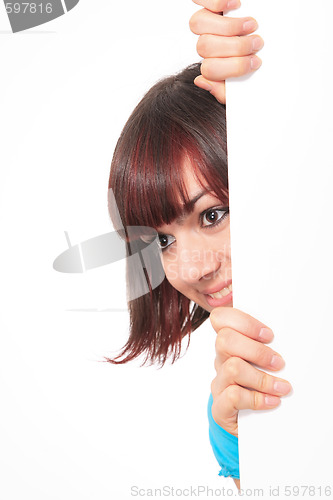 Image of Beautiful woman holding empty white board