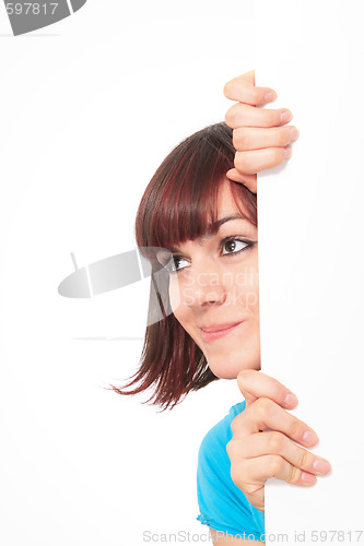 Image of Beautiful woman holding empty white board