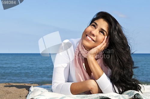 Image of Young native american woman at beach