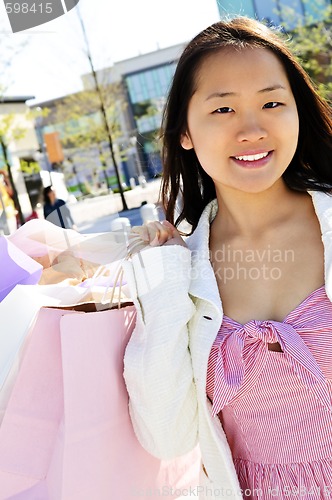 Image of Asian woman shopping