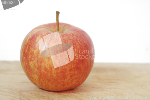 Image of apple on wood