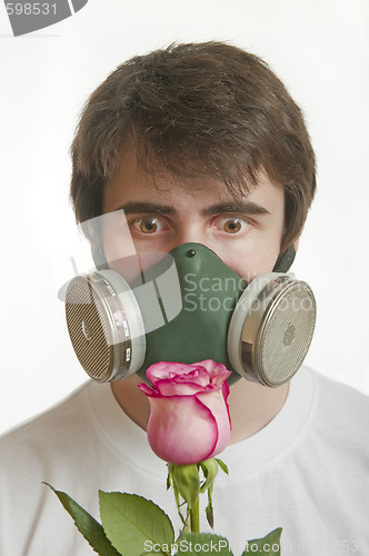 Image of young man in respirator mask 