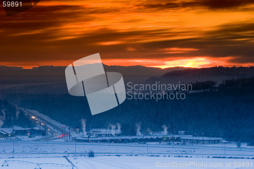 Image of Sunset over frozen town