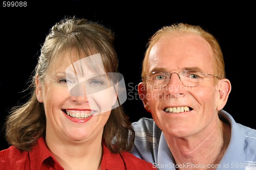 Image of Middle Aged Couple Smiling