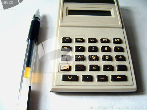 Image of Ball pen and calculator