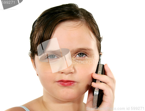 Image of Suspicious Child With Cell Phone