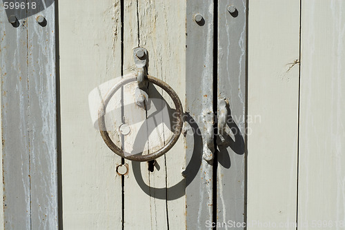 Image of wooden door with handles