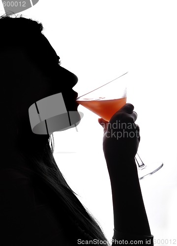 Image of woman drinking cocktail