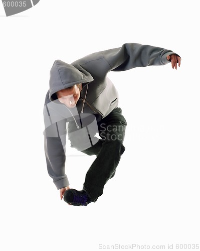 Image of Young male dancer makes a jump