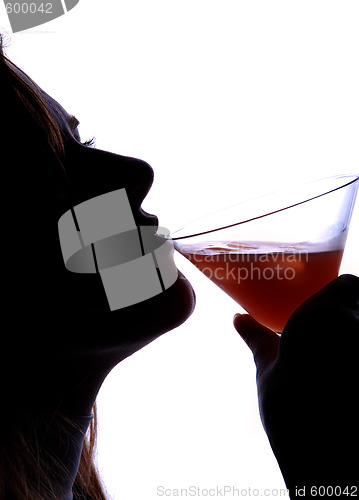 Image of woman drinking cocktail