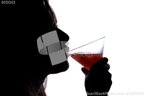 Image of woman drinking cocktail