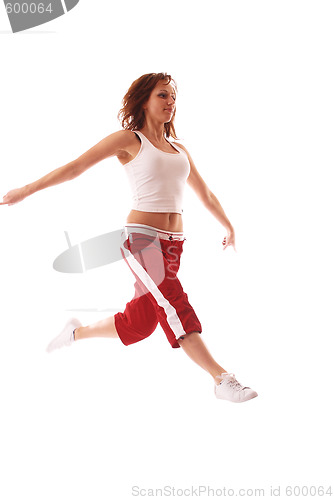 Image of attractive teenage dancing over white background