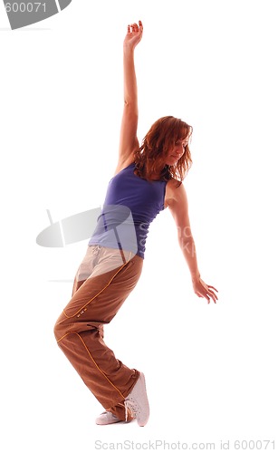 Image of attractive teenage dancing over white background