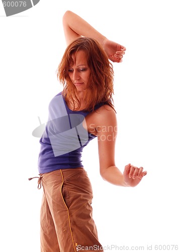 Image of attractive teenage dancing over white background