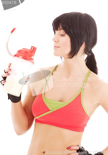Image of fitness instructor with protein shake