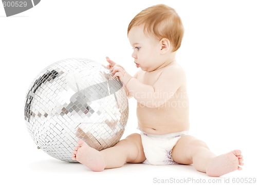 Image of adorable baby boy with big disco ball