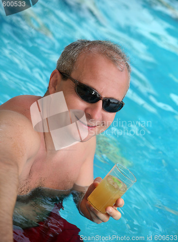 Image of Mature man in the pool