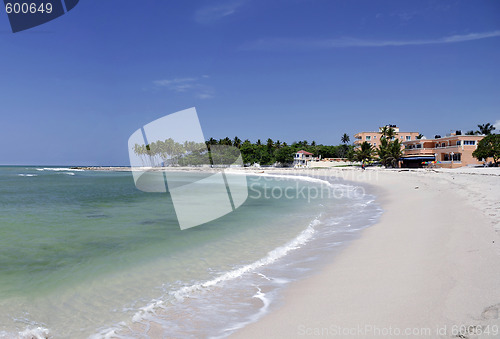 Image of A tropical resort hotel on the beach on a beautiful summer day