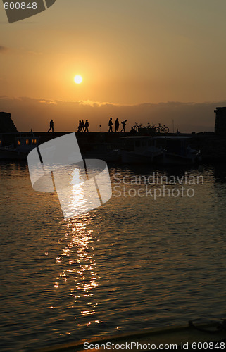 Image of Crete harbour sunset vertical