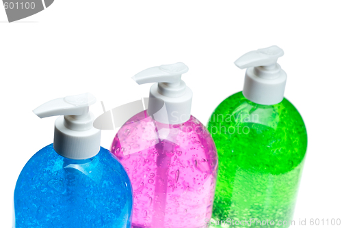 Image of hair gel bottles over white