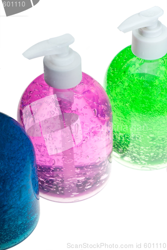 Image of hair gel bottles over white