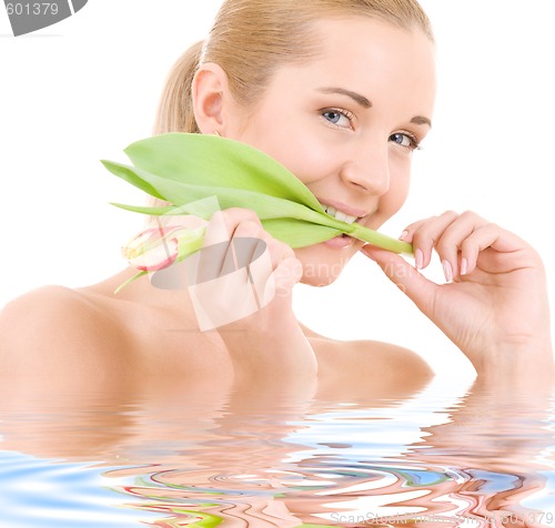 Image of happy woman with flower