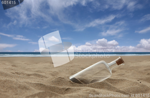 Image of Beautiful Beach With Corked Bottle