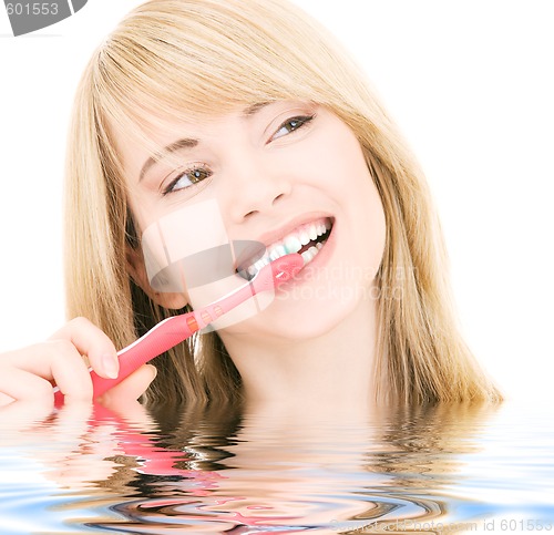 Image of happy girl with toothbrush