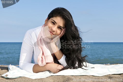 Image of Young native american woman at beach