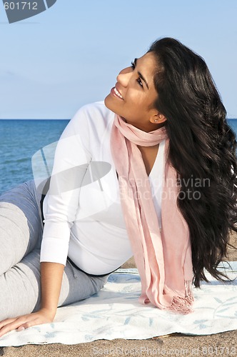 Image of Young native american woman at beach