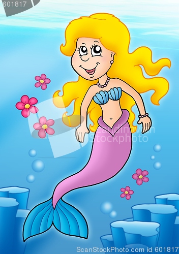 Image of Mermaid with flowers in sea