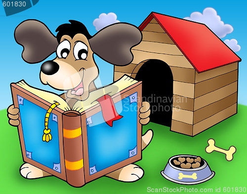 Image of Dog with book in front of kennel