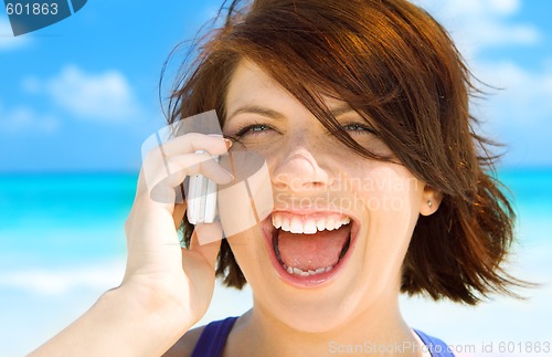 Image of happy woman with cell phone