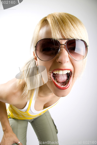 Image of attractive casual woman screaming