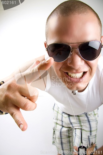Image of casual young man screaming