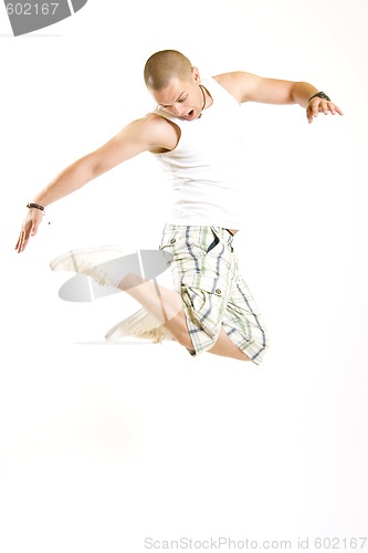 Image of casual young man jumps in the air