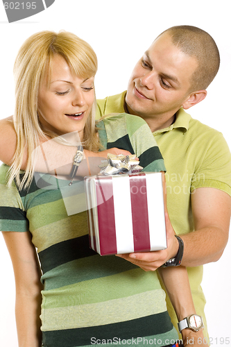 Image of man giving a present to his girlfriend