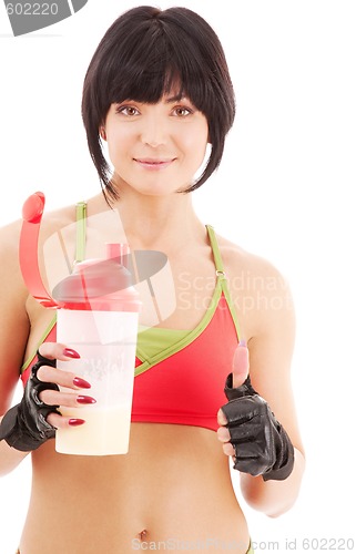 Image of fitness instructor with protein shake