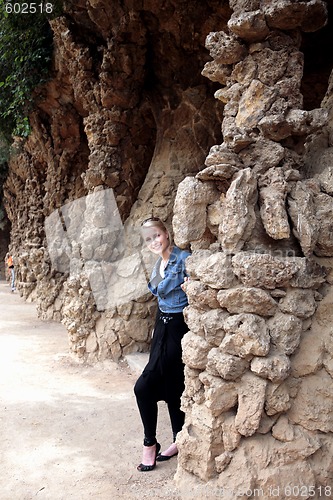 Image of  Yong woman in Park Guell (Antoni Gaudis) Barcelona Spain