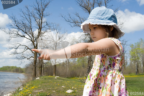 Image of Child Pointing At The Beach