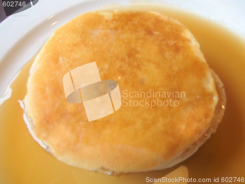 Image of Stack of pancakes with maple syrup